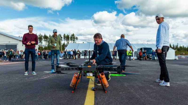 A man tends to a drone