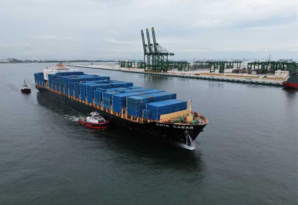A tanker enters a port